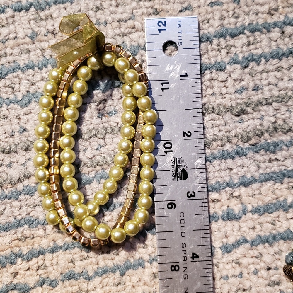 Set of green stretchy bracelets